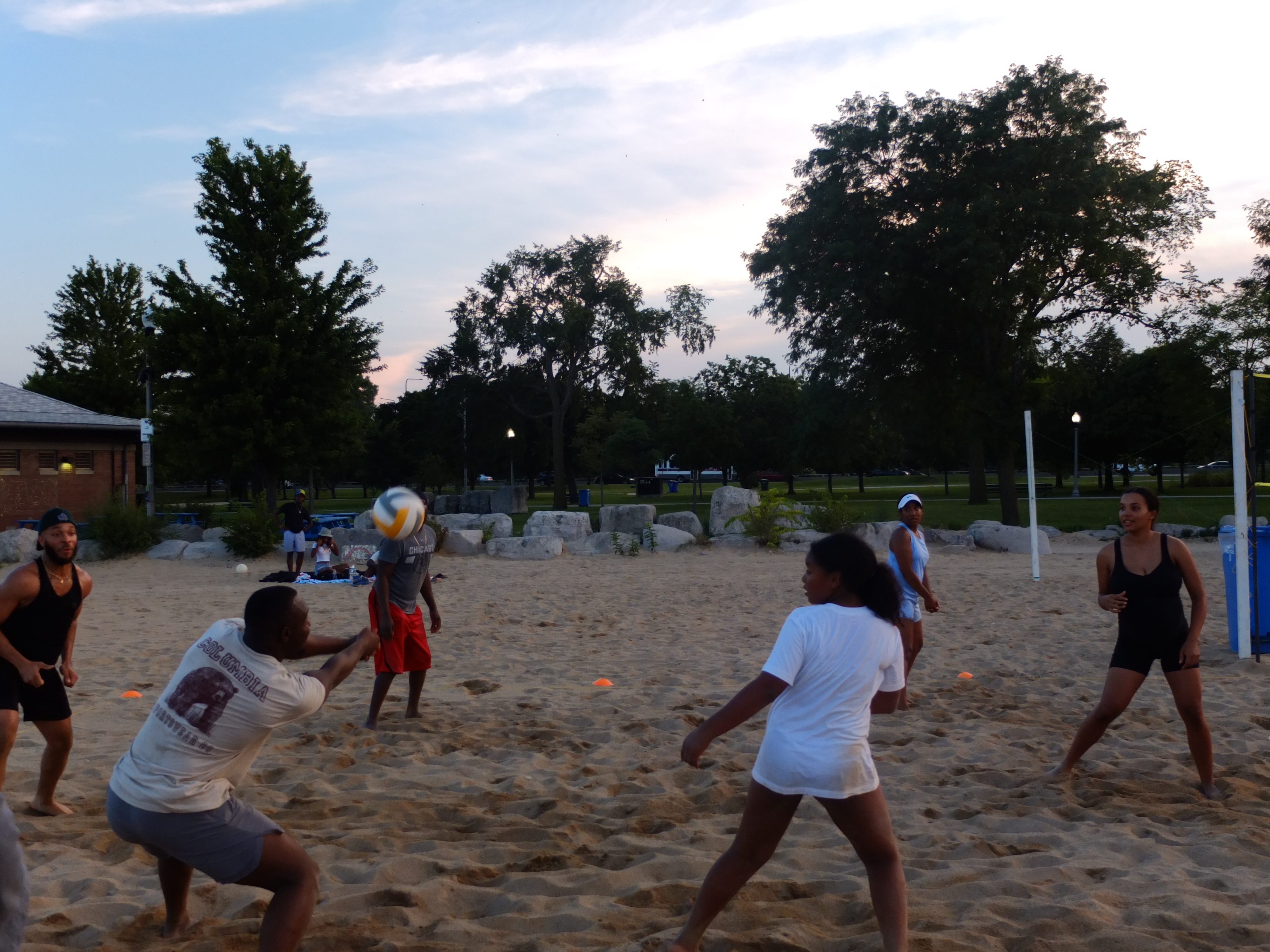 Beach volleyball at dusk